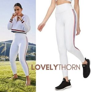 GOOD AMERICAN // white high rise 7/8 leggings red & blue side stripes